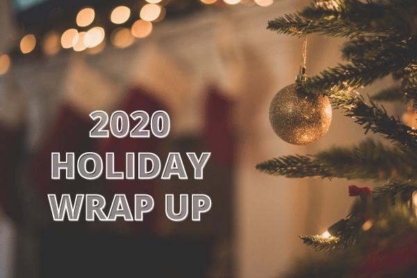 Xmas tree branches with a gold bauble and text: 2020 holiday wrap up